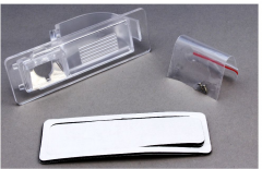 CAM-SCRP адаптер в подсветку номера Skoda Rapid / VW Jetta 2013 +